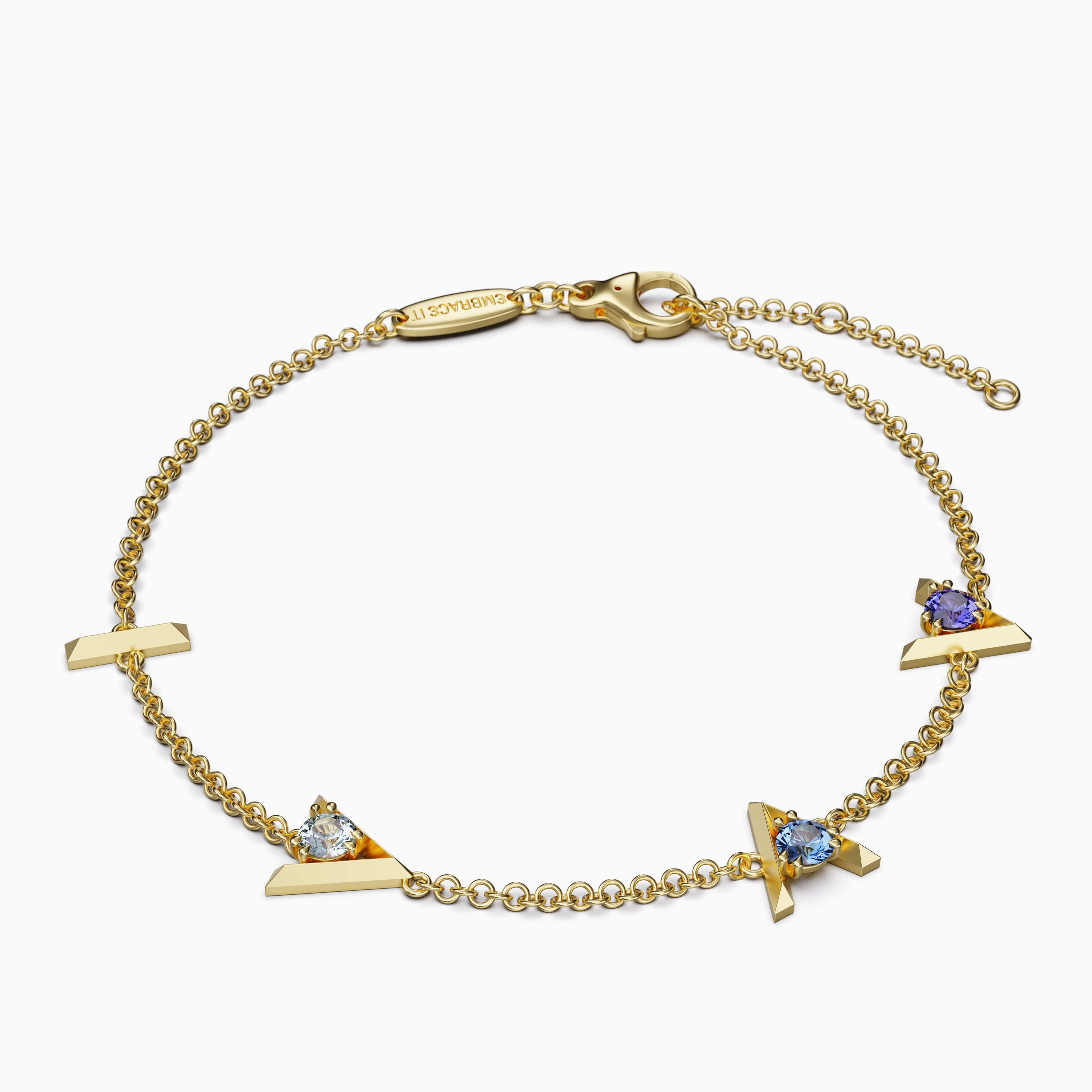 18 karat Gold bracelet with “I am greater than my highs and lows” charms and three different blue gemstones.