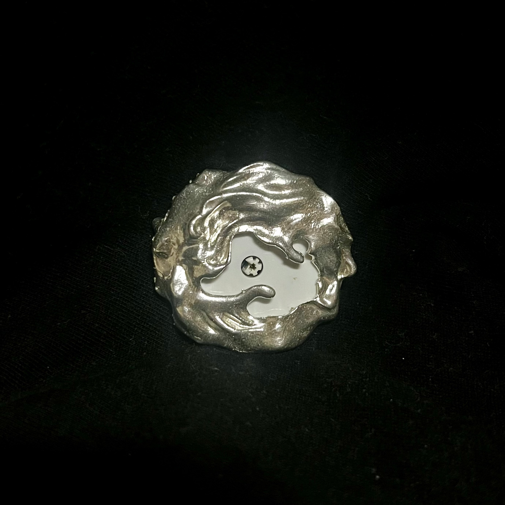 Eleuri Marea Silver CGM armlet in rhodium-plated brass with wave-inspired sculptural design