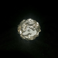 Eleuri Marea Silver CGM armlet in rhodium-plated brass with wave-inspired sculptural design