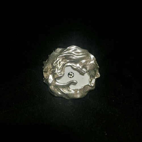 Eleuri Marea Silver CGM armlet in rhodium-plated brass with wave-inspired sculptural design