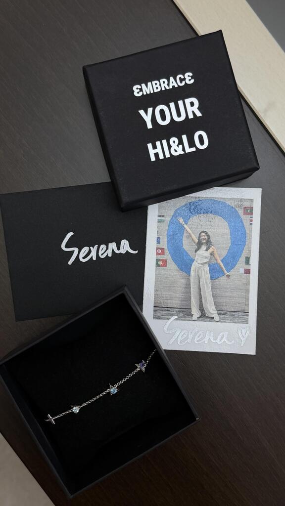 hi&lo signature bracelet, a photo of a woman, and a black box with 'Embrace Your Hi&Lo' text on a dark surface.